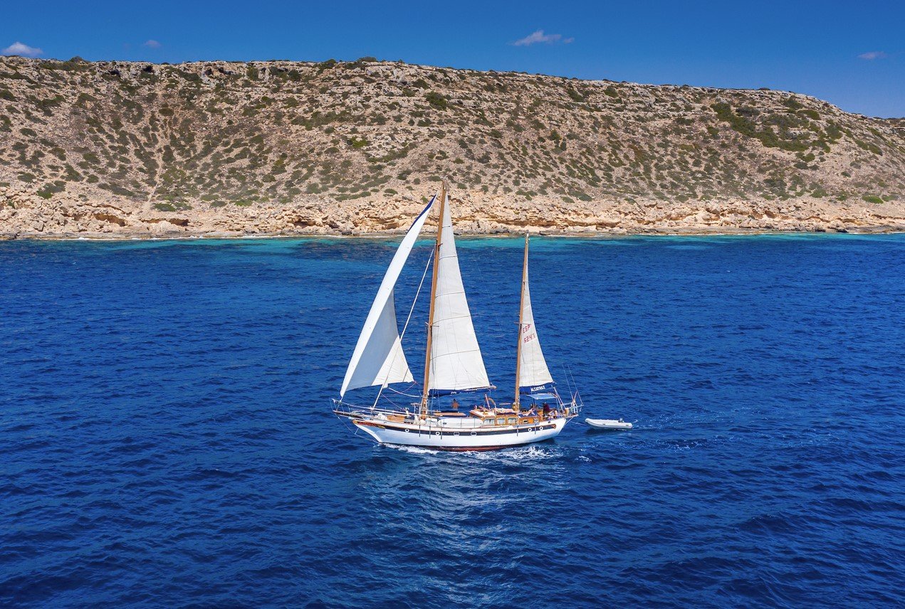 sailboat by the coast